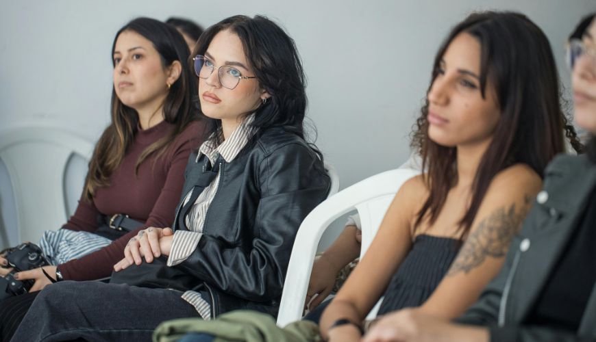 Four women with disinterested looks
