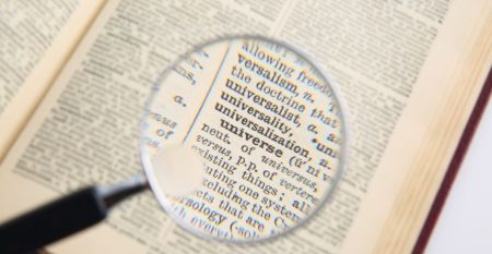 Magnifying glass featuring the word Universe